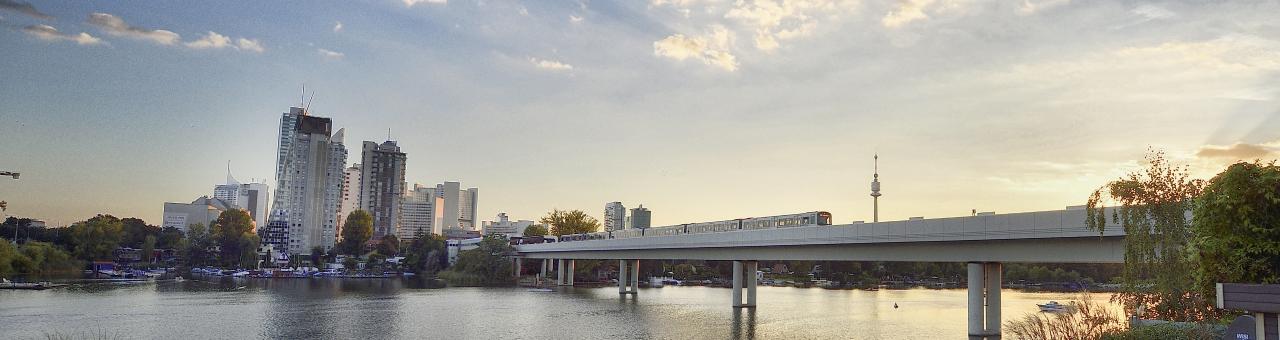 an underground train crosses the river Danube on a bridge