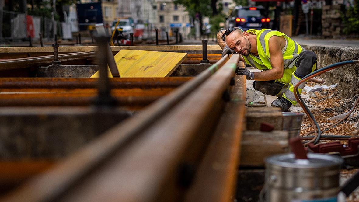 tram tracks and construction site worker