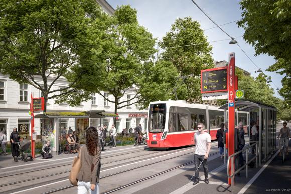 a Flexity streetcar cyclists on a biking lane and pedestrians in a green street with many trees and flowers