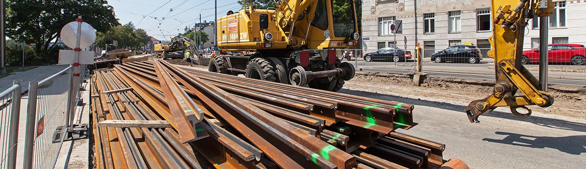 Tram tracks and a caterpillar at a construction site